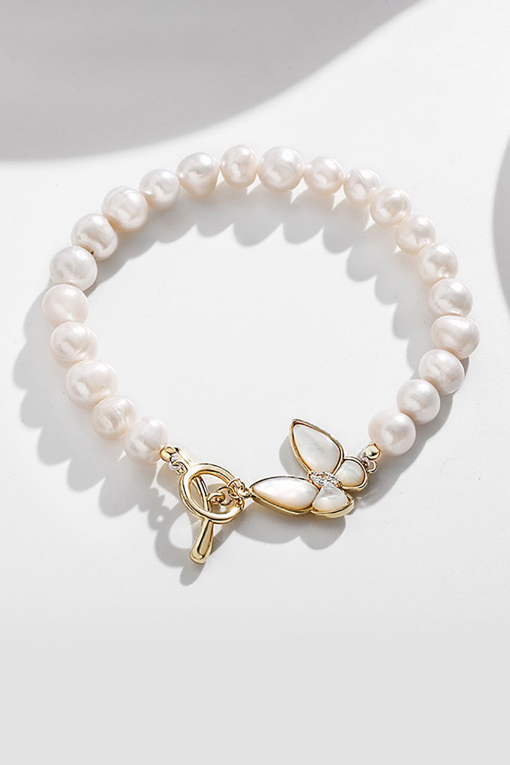 Sparkly White Pearl Stretch Bracelet with Butterfly